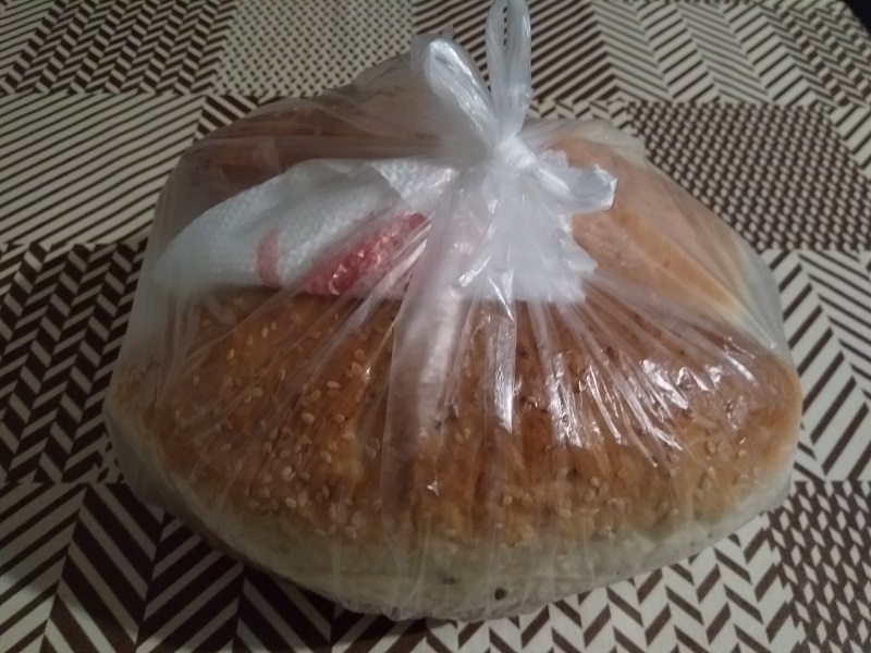 Bread buns from a bakery in North Macedonia. Why are there napkins inside the bag? Good question. I have no idea.