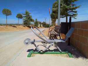 Sun, Sweat, and Exercise - Outdoor Fitness Equipment Beside of the Road